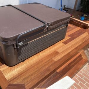partially finished deck with hot tub placed back on it