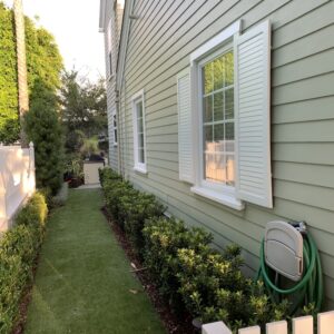 finished siding on the left side of the home by trinity home maintenance