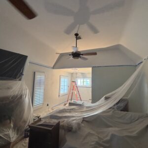 living room taped off for painting