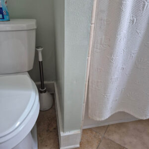 wall corner by toilet after
